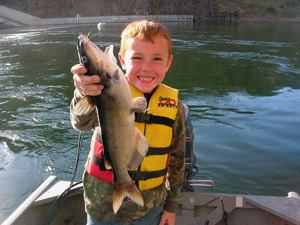 Young Fisherman with Catfish